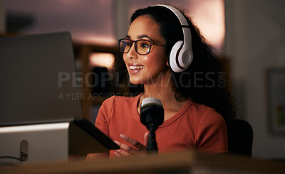 Buy stock photo Woman, headphones and laptop with radio DJ or podcast, public relations journalist and live broadcast at night. Mic, talk show and communication for social media streamer and content creation