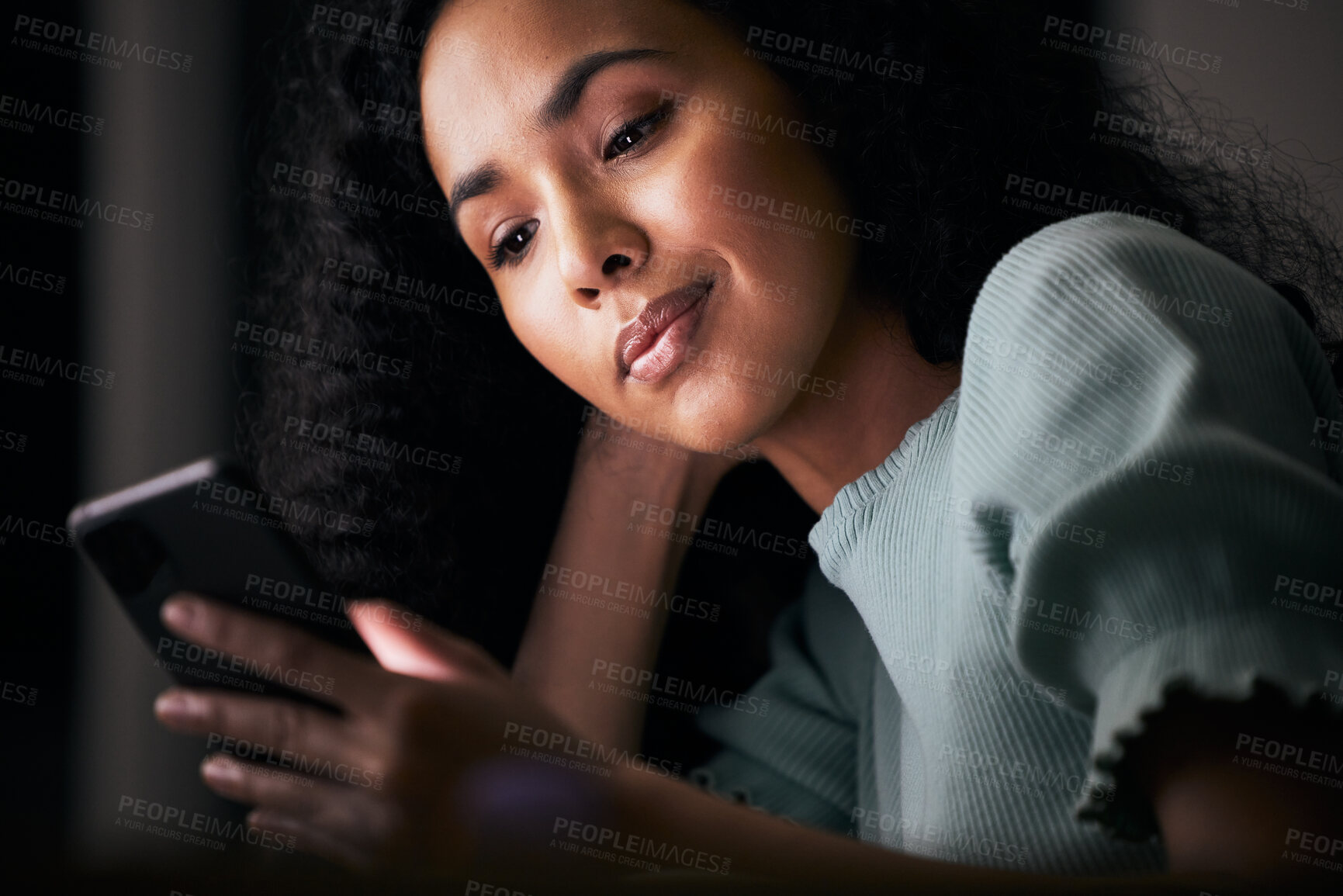 Buy stock photo Phone, reading and professional woman at night typing, search online or contact social media user. Dark office, smartphone and face of employee research mobile app, web information or check email