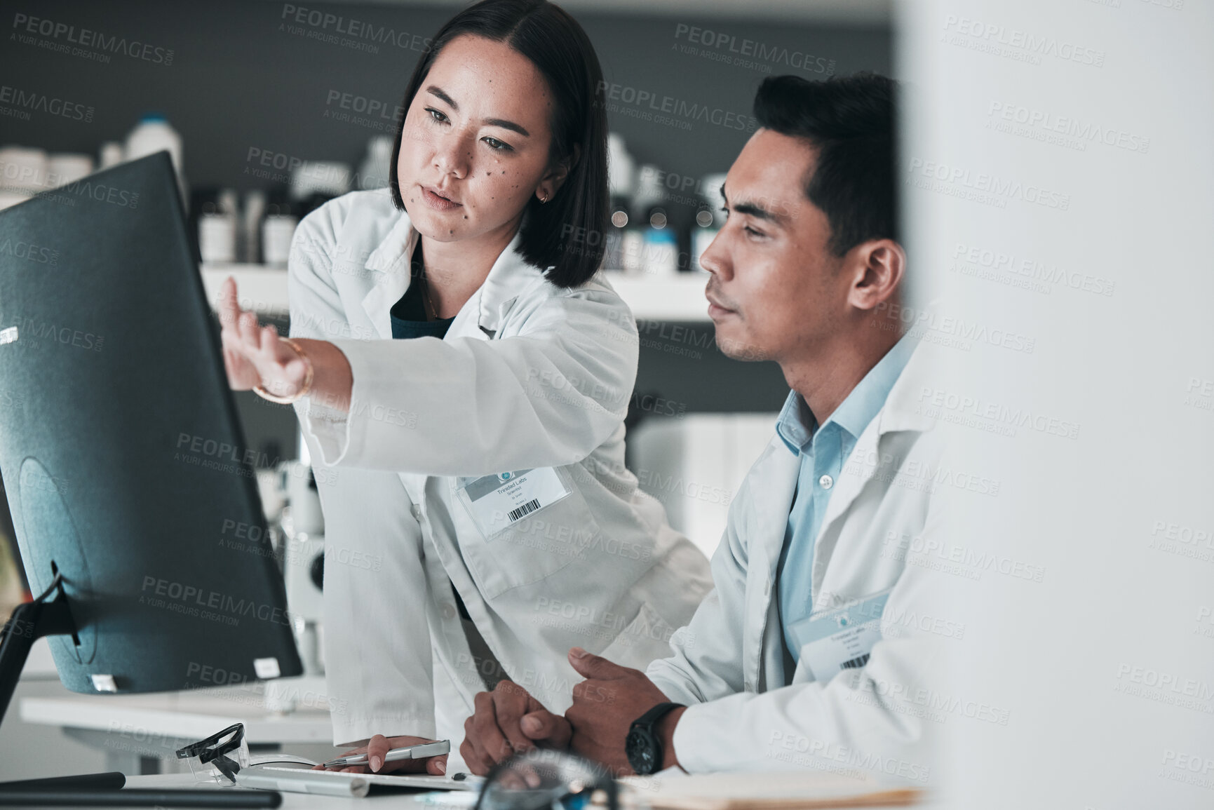 Buy stock photo Scientist, teamwork and computer for medical analysis or laboratory report, research and training support. Science doctors or people talking of vaccine solution, advice and desktop for online results