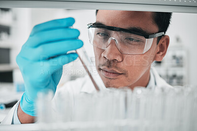 Buy stock photo Lab scientist, test tube and face of man in laboratory studying chemical analysis, pharma research and vaccine development. Science, asian chemistry technician and assessment of sample for innovation