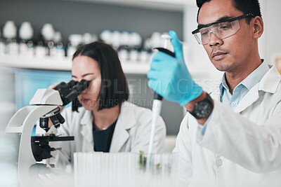 Buy stock photo Science, collaboration and experiment with a team in a lab for research or innovation in medicine. Teamwork, investigation or breakthrough with scientist colleagues working in a medical laboratory