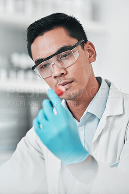 Buy stock photo Science, test and man with tube in laboratory for chemical analysis, inspection and vaccine development. Asian scientist with blood sample for dna results, research investigation or pharma assessment