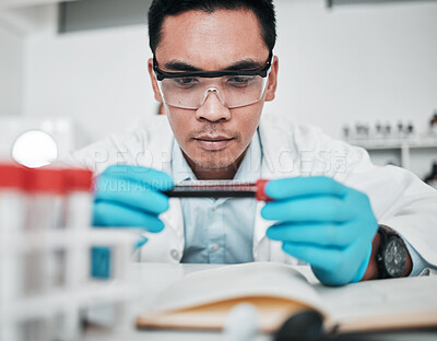 Buy stock photo Science, blood test and man in laboratory for medical analysis, health inspection or vaccine development. Asian scientist studying tube for dna results, chemistry investigation or planning assessment