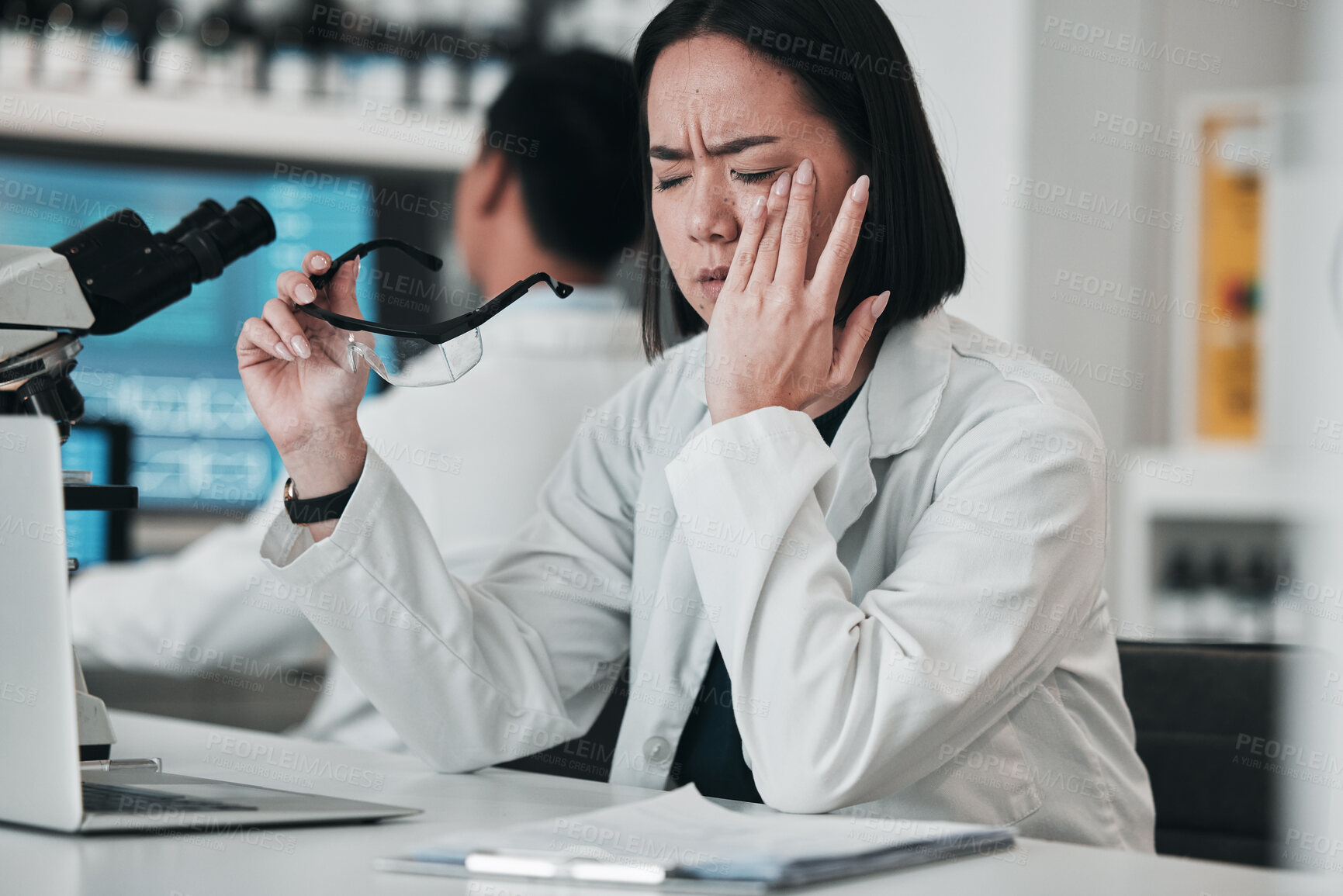 Buy stock photo Stress, headache and scientist woman in laboratory working with microscope, tech and pharmaceutical research or results. Tired, fatigue and professional burnout in science, lab or person with pain