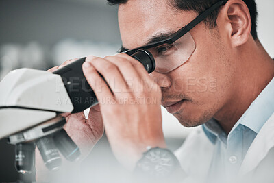 Buy stock photo Man, scientist and microscope in forensic discovery, research or science study at laboratory. Closeup of male person, medical or specialist looking in scope for DNA, vaccine or cure to virus in lab