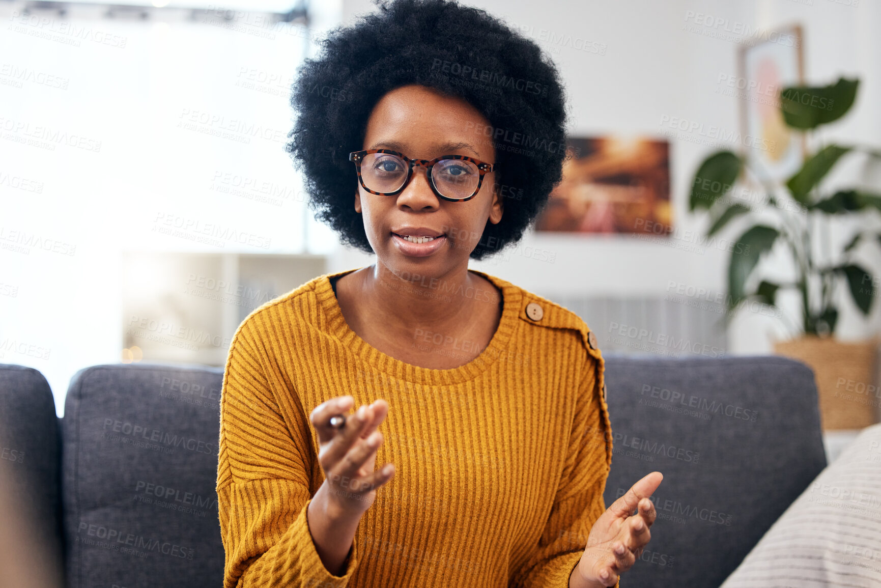 Buy stock photo Black woman, therapist and talking with advice on sofa in psychology, office and holistic discussion of mental health or trauma. Professional, psychologist and person speaking of depression on couch