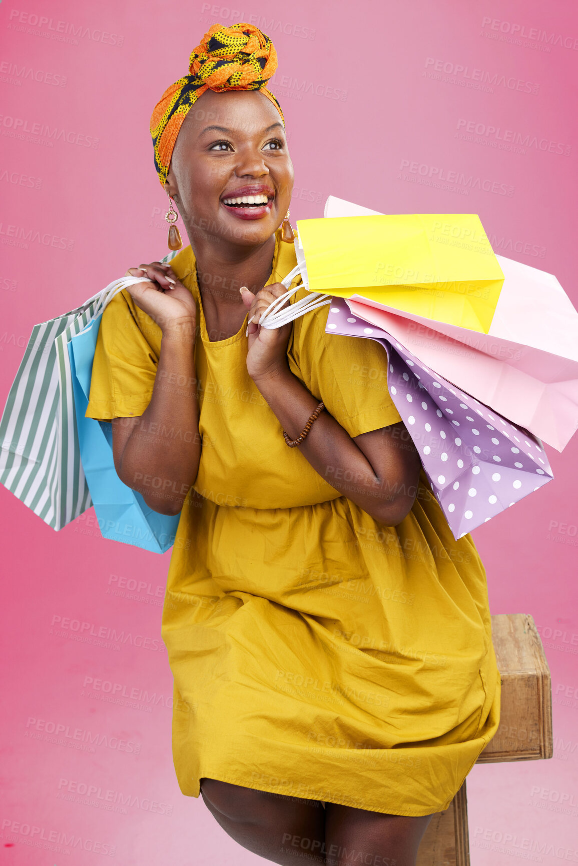 Buy stock photo Shopping, thinking and black woman with bags, luxury items and fashion on a pink studio background. African person, customer or model with expensive clothes, retail or boutique products with decision