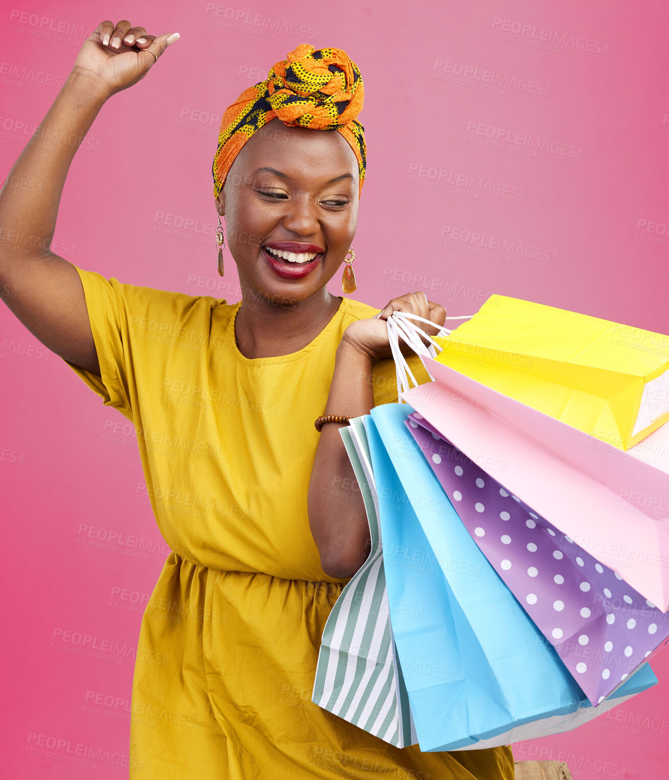 Buy stock photo Shopping, smile and black woman with bags, excited and retail on a pink studio background. African person, customer and model with luxury items, expensive clothes and boutique products with wealth