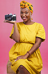 Camera, photographer portrait and happy black woman for lens photo, profile picture or creative photography, fashion or beauty. Studio photoshoot, happiness or African person smile on pink background