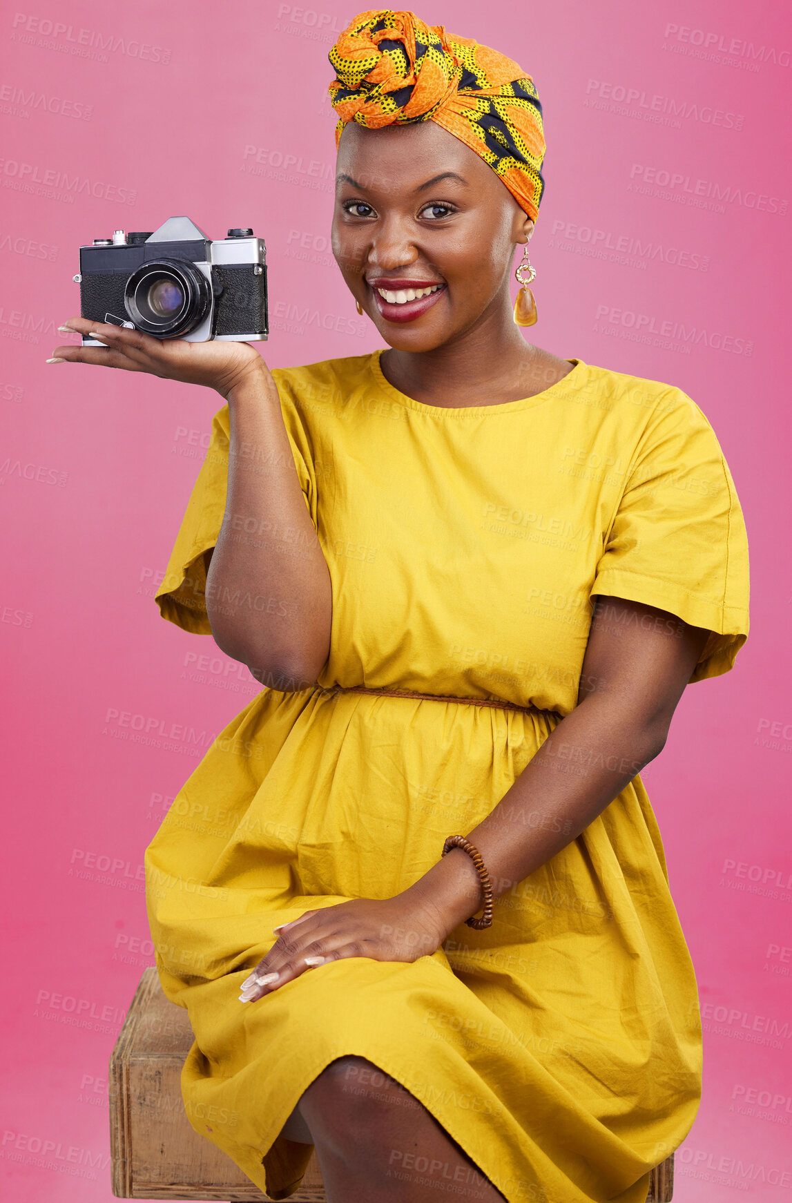 Buy stock photo Camera, photographer portrait and happy black woman for lens photo, profile picture or creative photography, fashion or beauty. Studio photoshoot, happiness or African person smile on pink background