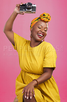 Buy stock photo Studio camera, photographer and happy black woman excited for lens photo, content creation or photography. Creative photoshoot, equipment and talent with African person smile on pink background