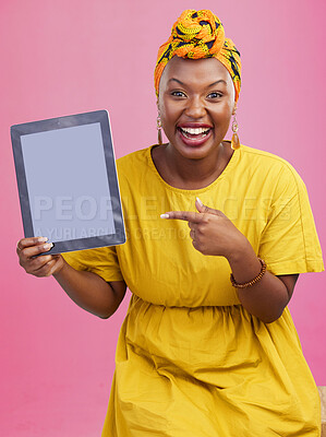 Buy stock photo Happy black woman, portrait and pointing to tablet mockup in advertising against a studio background. African female person smile showing technology display, screen or mockup for deal, app or sale