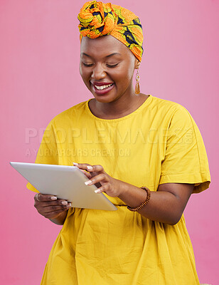 Buy stock photo Black woman, tablet and communication, app and social media with chat, internet search and wireless in studio. Scroll online with smile, African user with tech and touchscreen on pink background