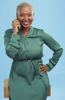 Buy stock photo Phone call, happy and black woman in portrait, talking and listening to contact in studio isolated on a blue background.  African person smile on smartphone conversation, speaking and communication.