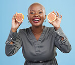 Happy black woman, portrait and orange for vitamin C, natural nutrition or diet against a studio background. Portrait of African female person smile with healthy organic citrus fruit in body wellness