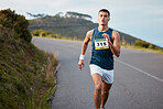 Fitness, nature and man athlete running for race, marathon or competition training on mountain. Sports, workout and young male runner doing an outdoor cardio exercise for endurance, speed or health.