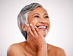 Beauty, face and mature happy woman feeling results of anti aging routine, skincare glow or facial cosmetics treatment. Collagen, studio and person smile for makeup foundation on white background 