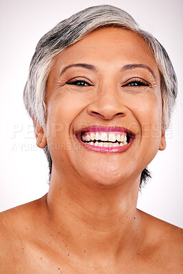 Buy stock photo Senior, happy woman and portrait with teeth in dental, hygiene or skincare against a studio background. Closeup or face of mature female person smile for tooth whitening, mouth or oral and gum care