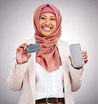 Muslim woman, ecommerce and credit card with a phone on a studio background for online shopping. Happy, portrait and an Islamic person with a mobile app for banking, finance management and payment