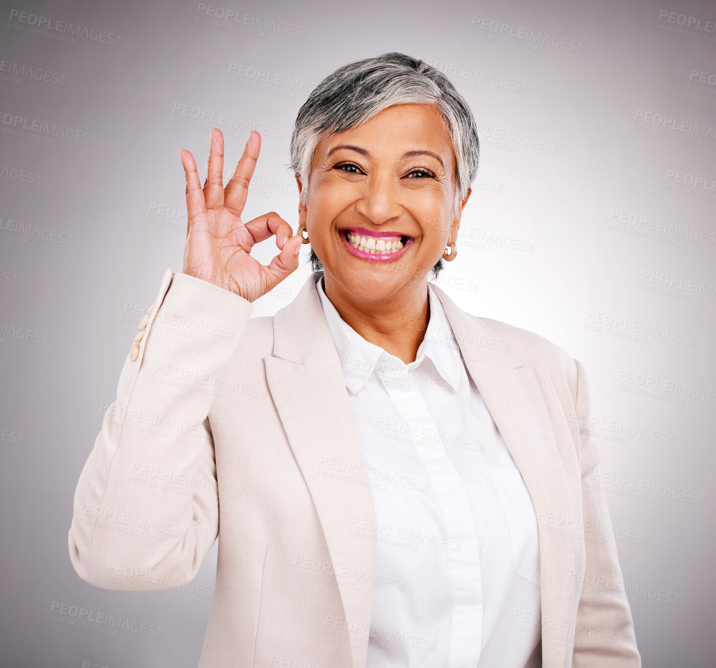 Buy stock photo Okay sign, studio and portrait of business woman smile for success, approval and agreement. Success, corporate and face of mature person with hand gesture for like, yes and emoji on gray background