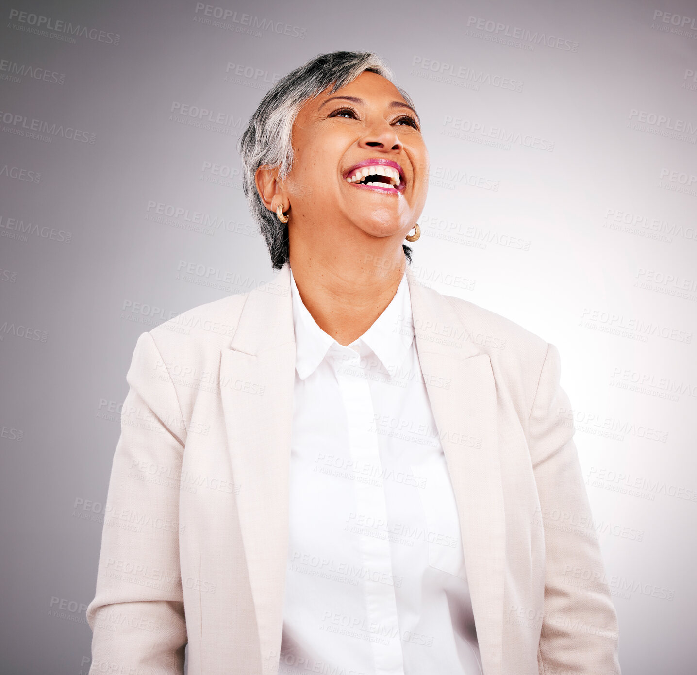 Buy stock photo Smile, funny and a mature business woman laughing in studio on a gray background for vision or growth. Comic, corporate and future with a happy professional looking confident in an executive suit