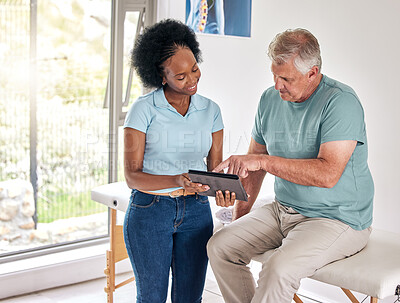 Buy stock photo Senior man, physiotherapist and tablet for consultation, healthcare and rehabilitation. Chiropractor on technology for physical therapy of patient, happy black woman and recovery, healing or help