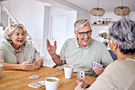 Senior friends, man and women with card game, competition and strategy with smile, chat and relax in home. Elderly group, poker and gambling with funny conversation, memory and retirement in house