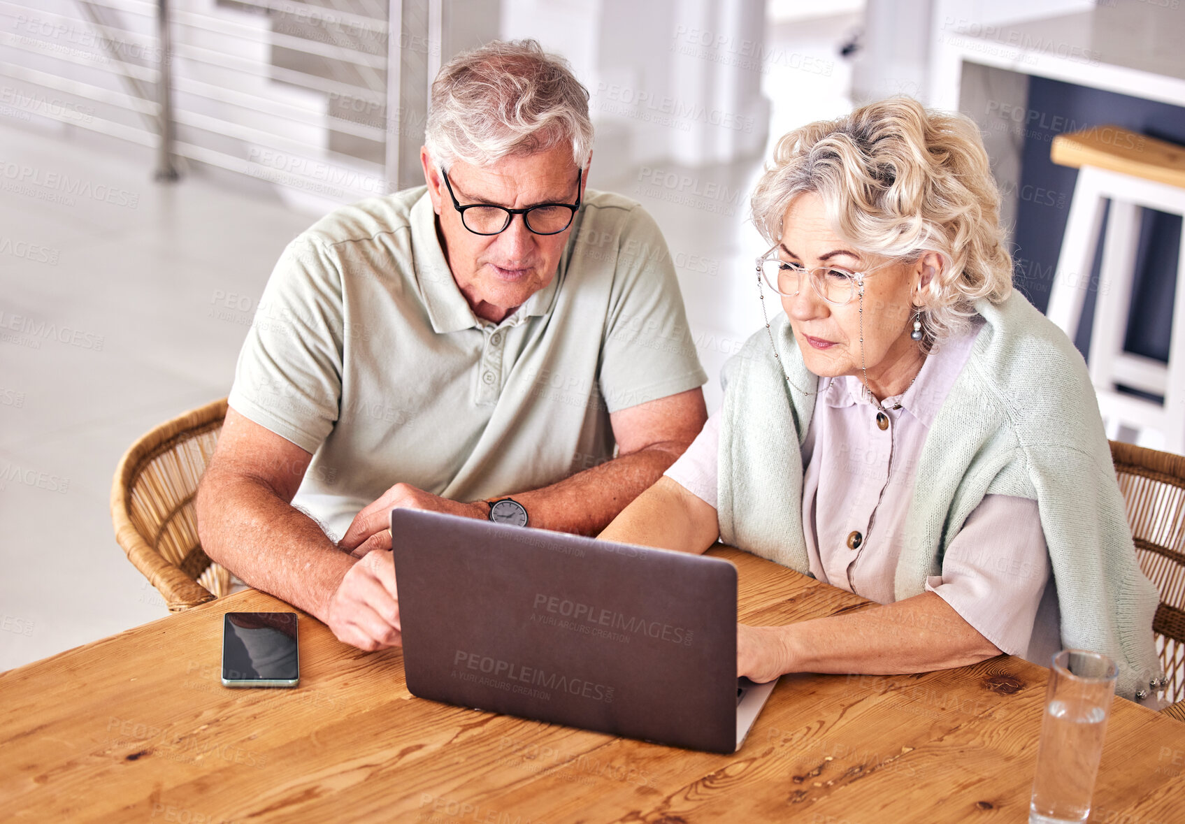 Buy stock photo Senior couple, laptop and search in home for online shopping, banking and planning insurance for retirement. Old man, elderly woman and typing on computer for financial investment, budget and network