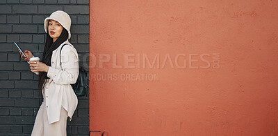 Buy stock photo Portrait of woman with phone, brick wall and mockup, urban fashion and social media chat with coffee. Streetwear, gen z girl or online influencer with smartphone, communication and relax on red space