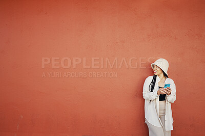 Buy stock photo Mockup, smile and woman with phone in city for travel, freedom or location guide on orange background. Smartphone, app and lady fashion influencer outdoor on social media, blog or podcast content