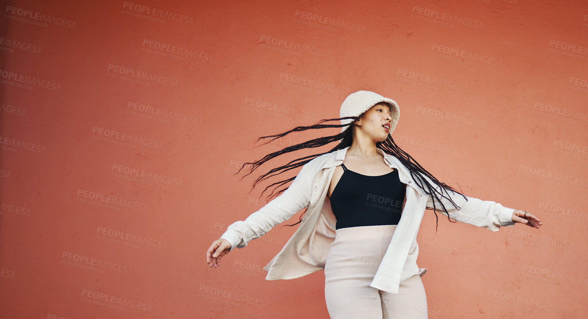 Buy stock photo Woman, fashion and city wall with mockup space, freedom style and urban clothes with confidence. Red background, traveling and stylish female person in town with cool and modern outfit and thinking