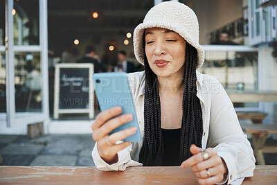 Buy stock photo Student, travel and woman with phone at a cafe for social media, texting or chatting in a city. Smartphone, app and lady influencer at coffee shop for content creation, podcast or traveling blog post