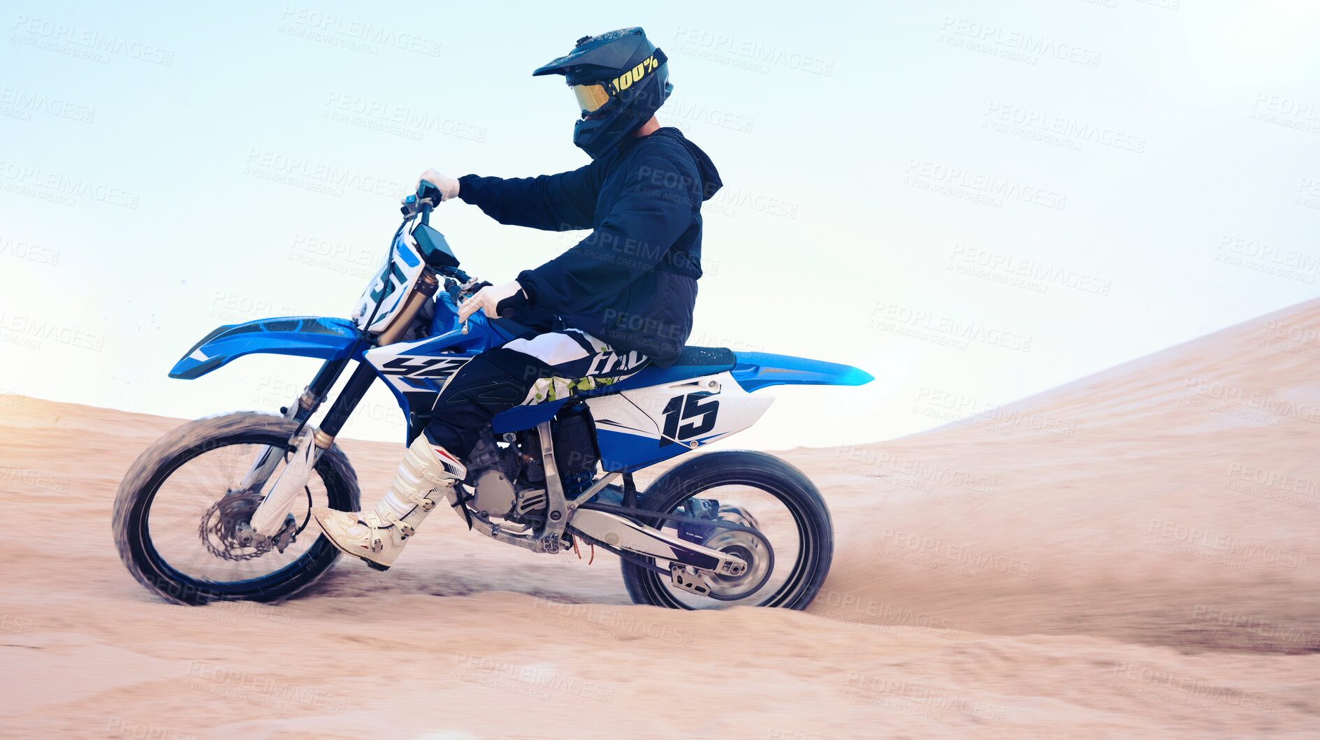 Buy stock photo Dirt, motorbike and athlete or man in sports, adventure and driving on desert, sand dune and outdoor riding in nature. Extreme sport, bike or motorcycle drive with helmet, gear or person with freedom