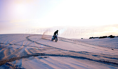 Buy stock photo Driving, sand dust or athlete on motorcycle for adventure, action or fitness in outdoor workout at sunset. Dirt, desert or sports driver on motorbike on dunes in training, exercise or race challenge 