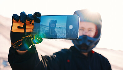 Buy stock photo Phone selfie, biker and man in desert adventure, nature or sport outdoor. Rider, helmet and person take picture on smartphone to travel on social media, transportation and off road journey in Namibia