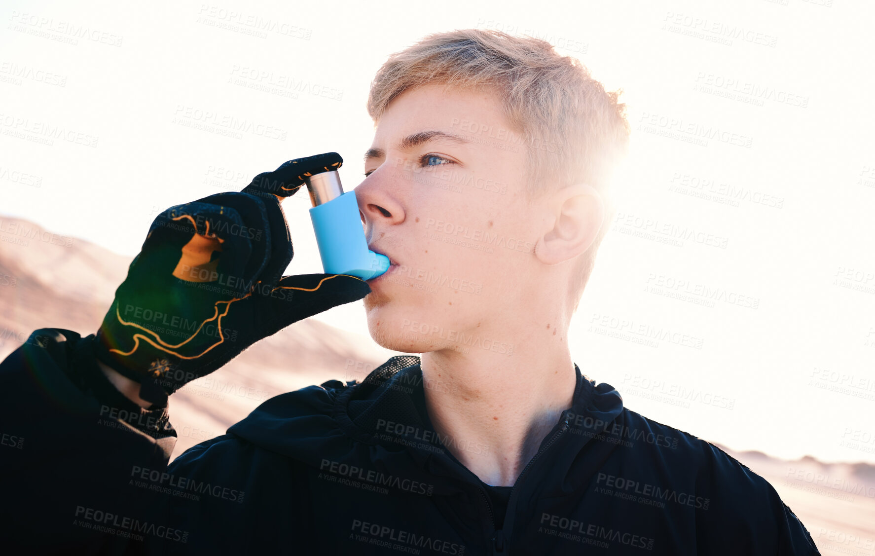 Buy stock photo Nature, man and an inhaler for asthma during exercise for a breathing emergency or medical help. Desert, biker and a racer or person with support for lungs after a race or outdoor competition