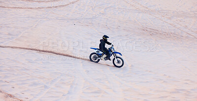 Buy stock photo Sand, travel or athlete driving motorcycle for action, adventure or fitness with performance or adrenaline. Desert, sports or person on motorbike on dunes for training, exercise or race or challenge