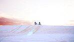 Sand, nature or people driving motorcycle for action, adventure or fitness with performance or adrenaline. Teamwork, desert or athletes on motorbike on dunes for training, exercise or race challenge