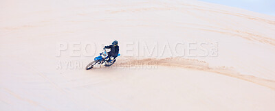 Buy stock photo Desert, sand or driver driving motorbike for action, adventure or fitness with performance or adrenaline. Nature, dirt or sports athlete on motorcycle on dunes in training, exercise or race challenge