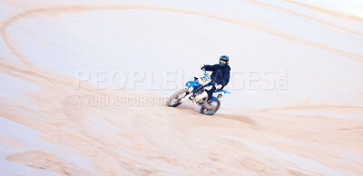 Buy stock photo Action, desert and a person on a bike for cycling, extreme sport and adrenaline on a vacation. Sand, competition and a bike or racer for travel, training or adventure for performance on a motorbike