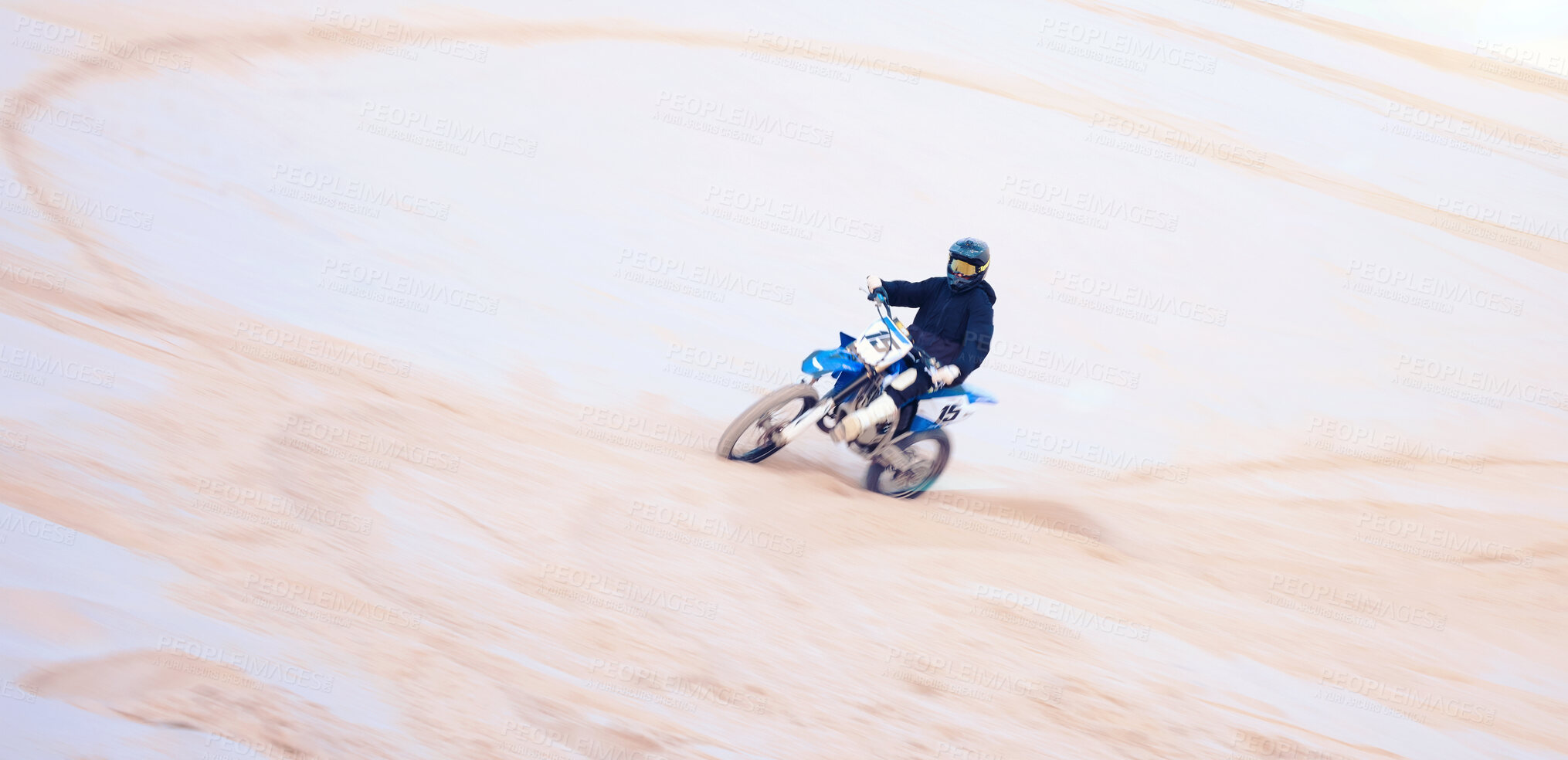 Buy stock photo Action, desert and a person on a bike for cycling, extreme sport and adrenaline on a vacation. Sand, competition and a bike or racer for travel, training or adventure for performance on a motorbike