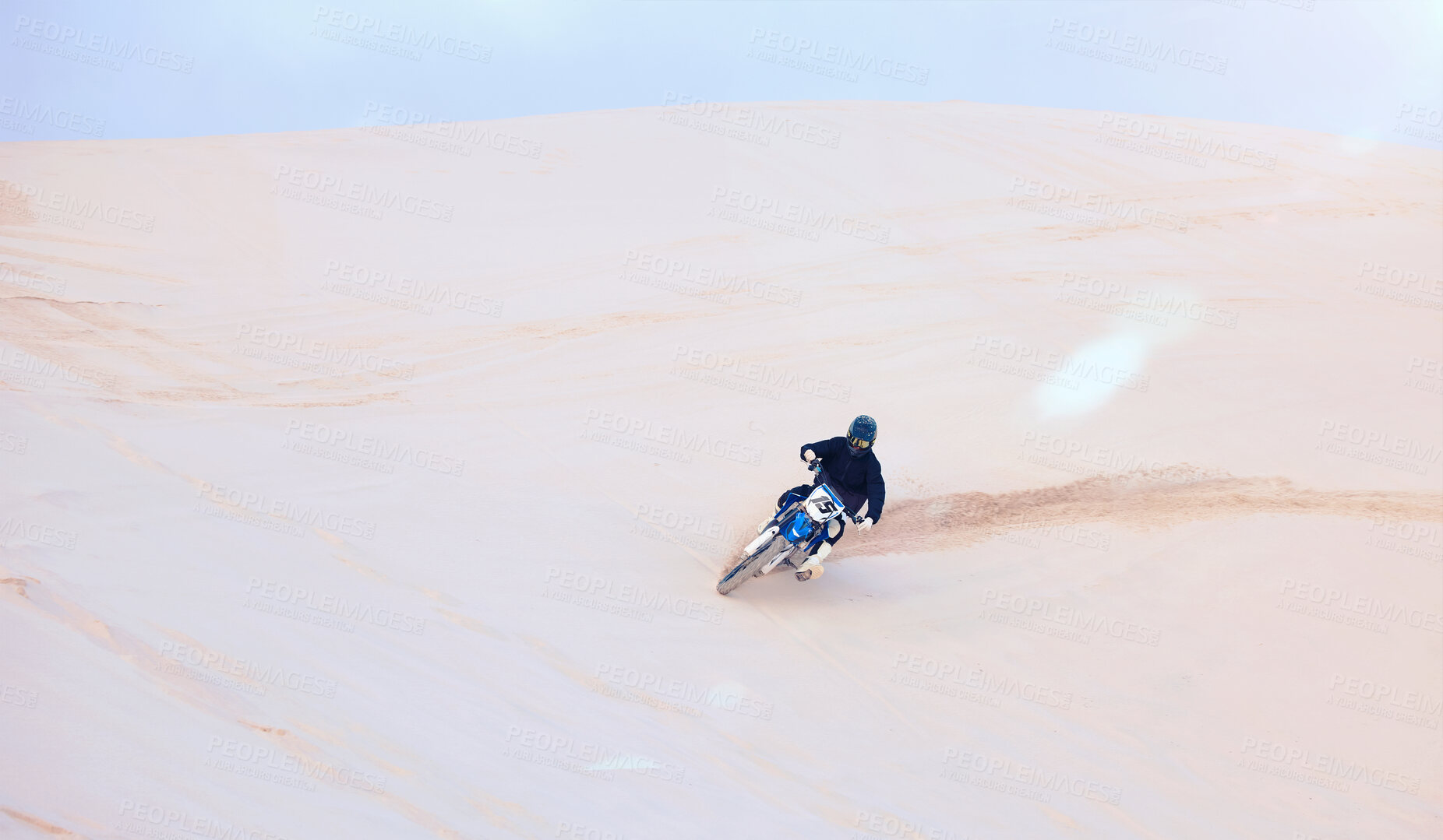 Buy stock photo Fast, sand or driver driving motorbike for action, adventure or fitness with performance or adrenaline. Nature, dirt or sports athlete on motorcycle on dunes in training, exercise or race challenge