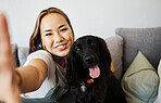 Love, selfie and woman with dog on home sofa to relax and play with animal. Pet owner, care and asian person influencer with companion, smile and friendship or social media profile picture and memory