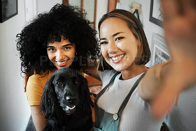 Buy stock photo Smile, selfie and portrait of lesbian couple with dog in modern apartment bonding together. Love, happy and interracial young lgbtq women taking a picture and holding animal pet puppy at home.