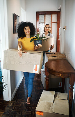 Buy stock photo Excited, homeowner or couple with boxes, lesbian or moving with real estate, achievement or happiness. Queer people, happy women or girl with marriage, mortgage or new apartment with property or love