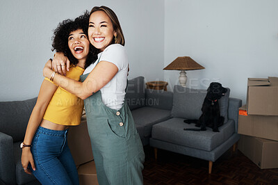 Buy stock photo Lesbian, couple and hug for moving, home and dog in living room with excited, happiness and investment in apartment or property. Happy, people and women together with pet in celebration of new house