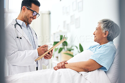 Happy woman in bed, doctor with medical chart and checklist for health insurance, consultation and advice. Smile in hospital, healthcare professional with patient information, results and talking.