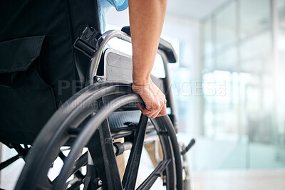 Buy stock photo Hand, rehabilitation and person in a wheelchair at a hospital for medical support, transportation and mobility. Closeup, help and a patient with a disability in a chair at a clinic for recovery