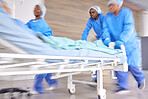 Surgery, emergency and running with doctors in hospital for medical, accident and operating room. Medicine, healthcare and wellness with people and rush in clinic for teamwork, fast and motion blur