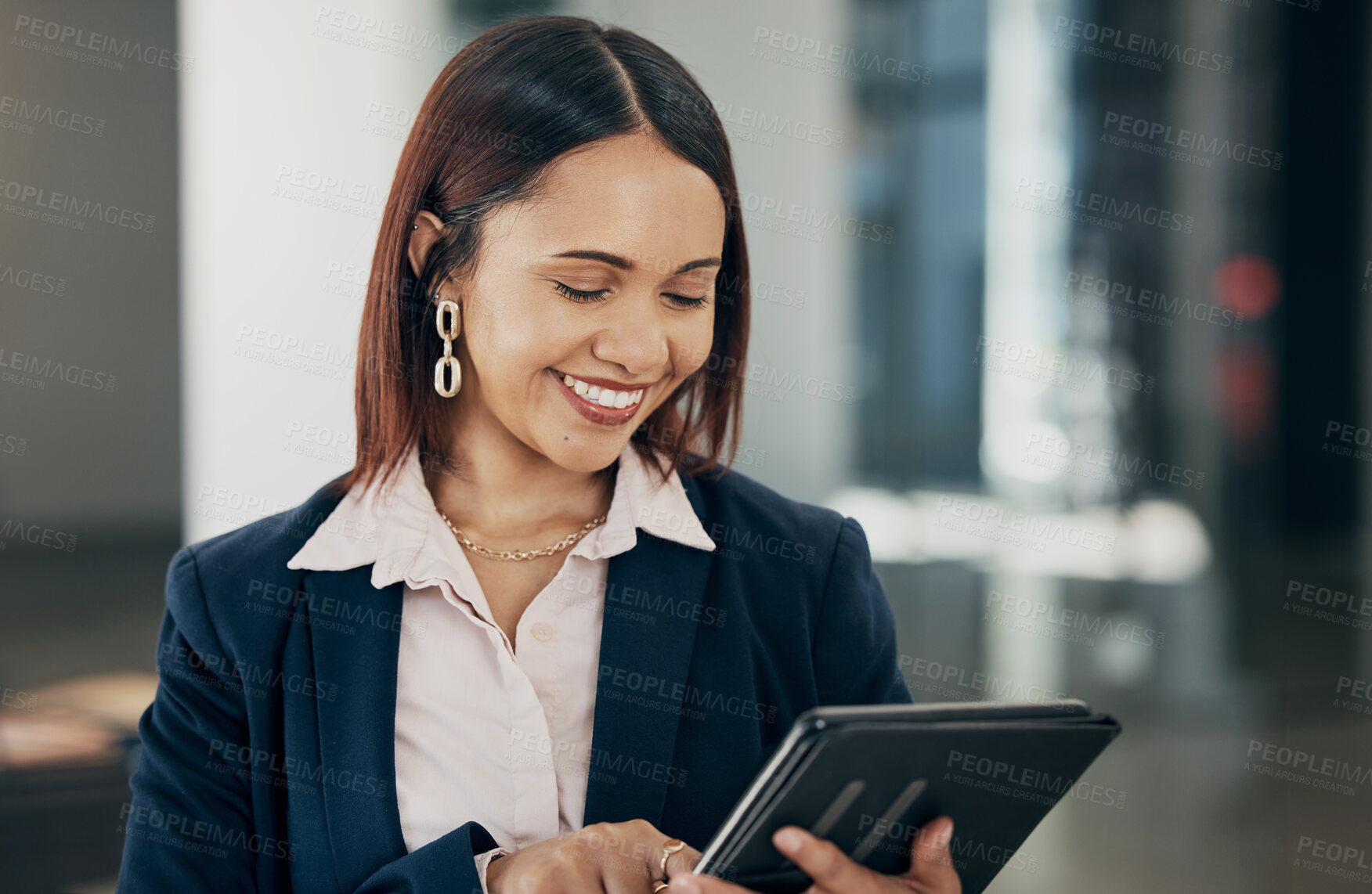 Buy stock photo Businesswoman in office with smile, tablet and reading email, HR schedule or report online for feedback. Internet, networking and communication on digital app, happy woman at human resources agency